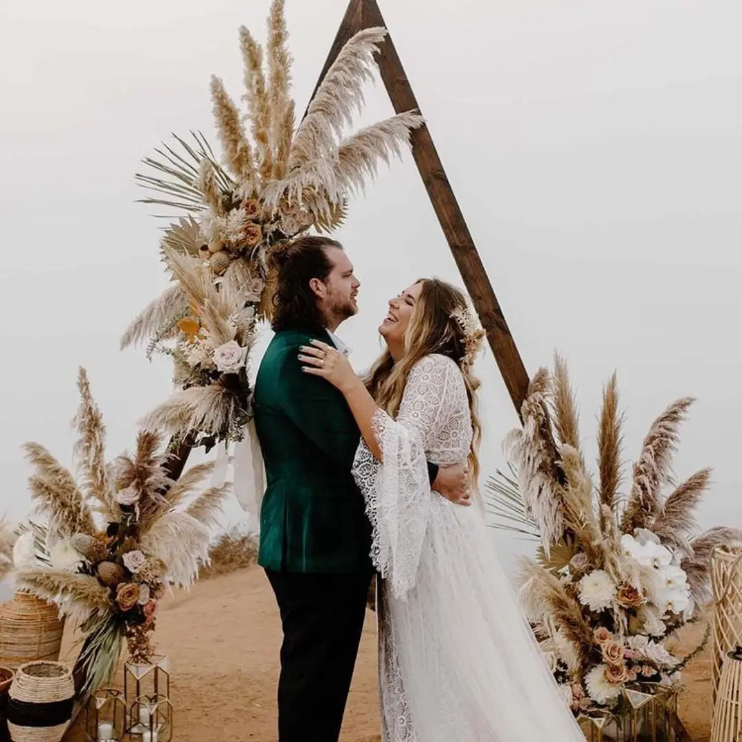 Luxury wedding ceremony at a grand Dubai palace venue with golden chandeliers