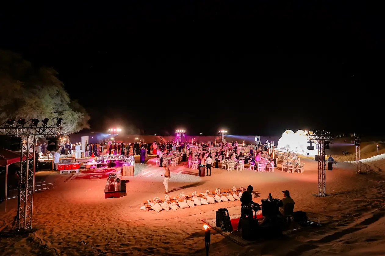 Luxury wedding guest experience welcome lounge with champagne and floral arrangements in Dubai hotel